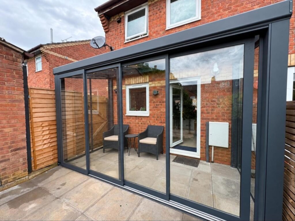 Fixed glass roof pergola with sliding glass doors, Adams Close, Wellingborough