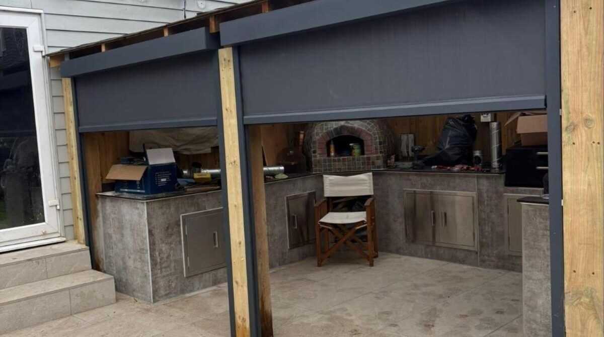 Outdoor kitchen with remote-controlled zip blinds, Dorset Avenue, Welling