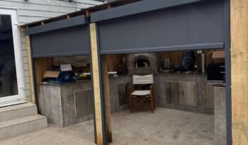 Outdoor kitchen with remote-controlled zip blinds, Dorset Avenue, Welling