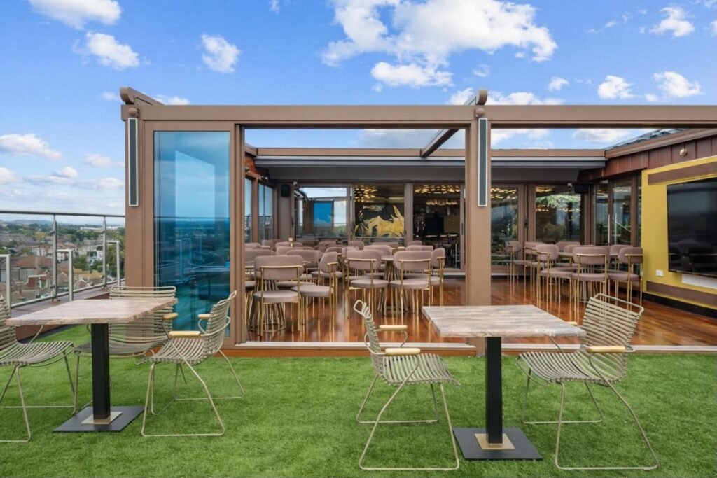 Retractable glass roof rooftop bar at Godino Sky Bar, Ilford
