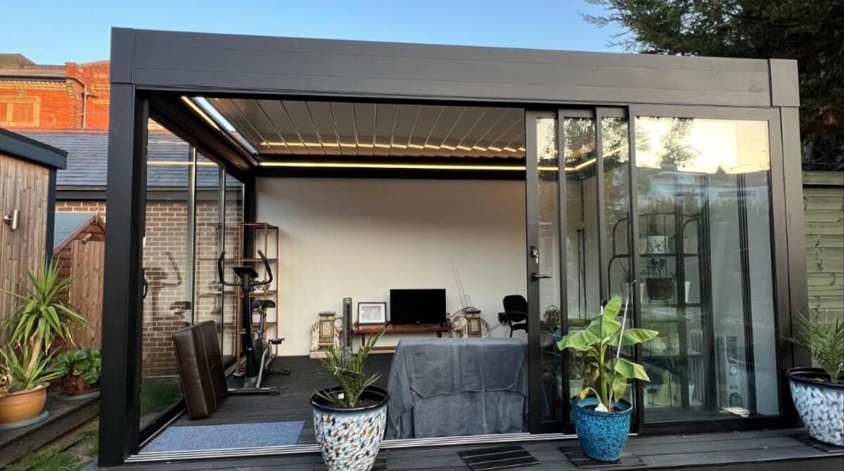 Retractable aluminium roof home gym garden room, North London