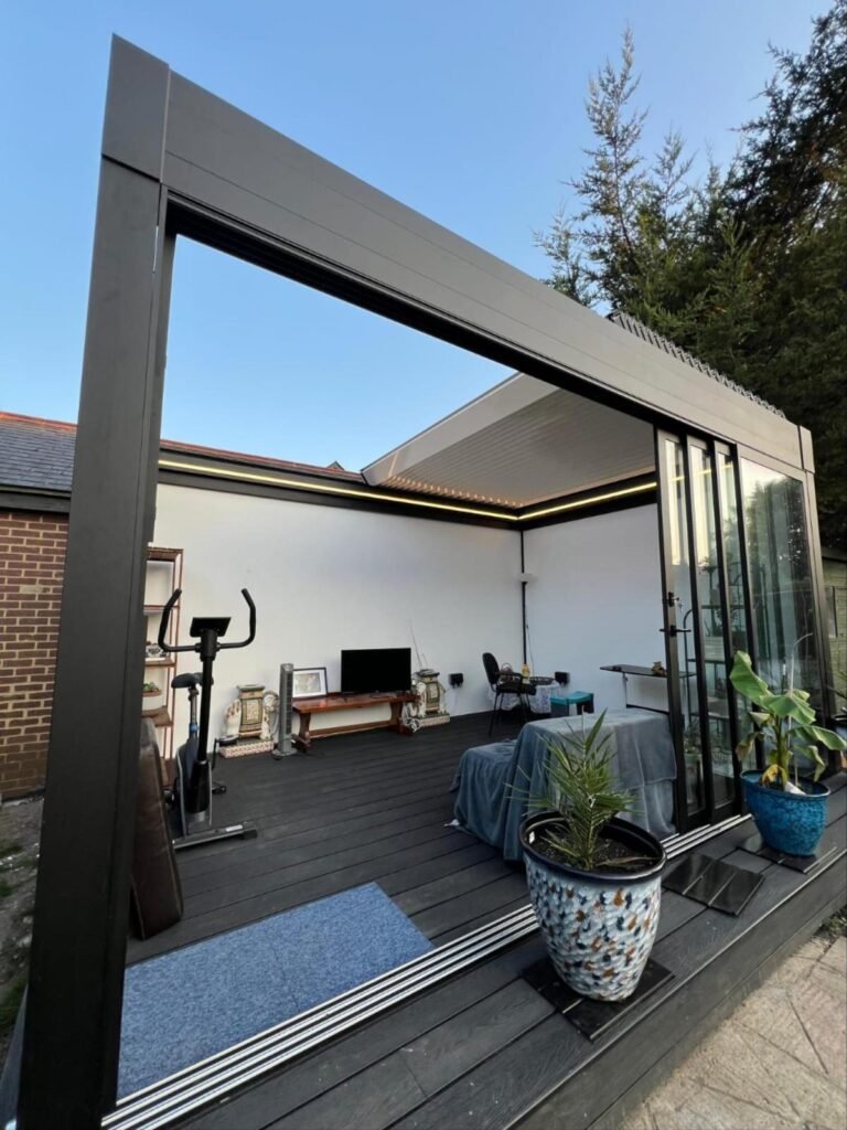 Retractable aluminium roof home gym garden room, North London
