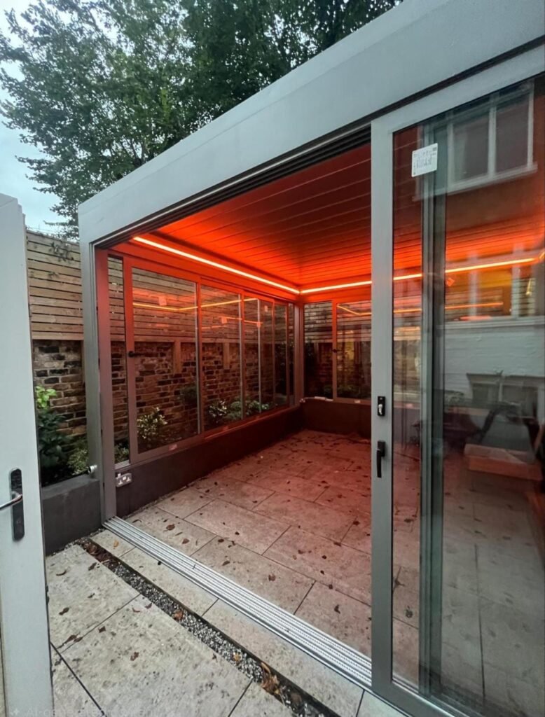 Retractable aluminium louvred roof with LED lighting, Pelham Street, London