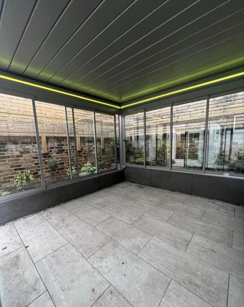 Retractable aluminium louvred roof with LED lighting, Pelham Street, London
