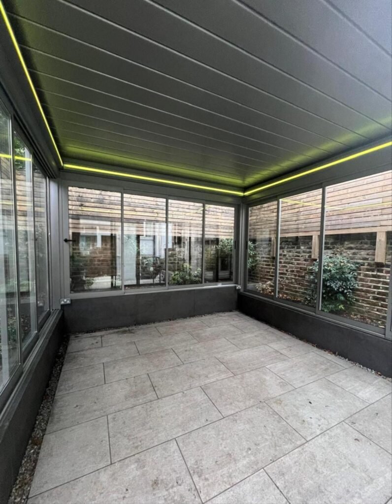 Retractable aluminium louvred roof with LED lighting, Pelham Street, London