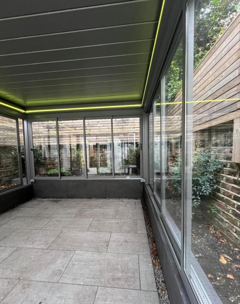 Retractable aluminium louvred roof with LED lighting, Pelham Street, London