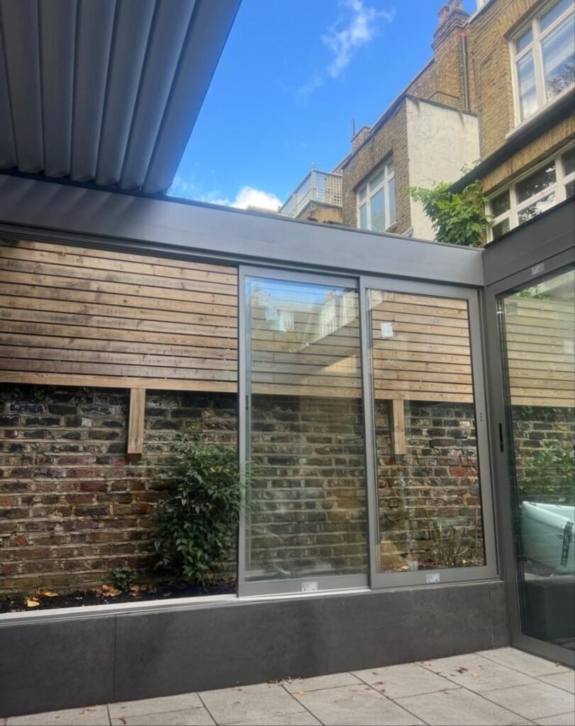 Retractable aluminium louvred roof with LED lighting, Pelham Street, London