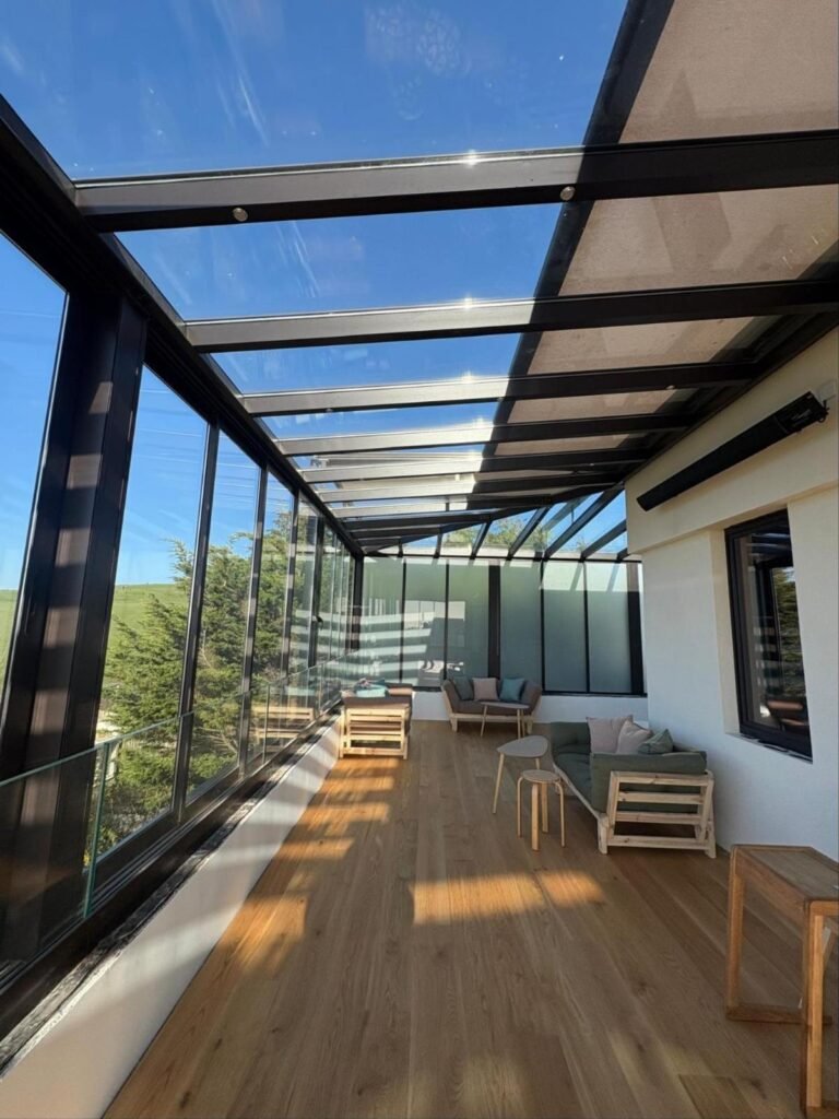 Fixed glass roof terrace with zip blinds and sea views, Roedean Crescent, Brighton