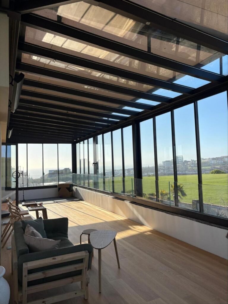 Fixed glass roof terrace with zip blinds and sea views, Roedean Crescent, Brighton