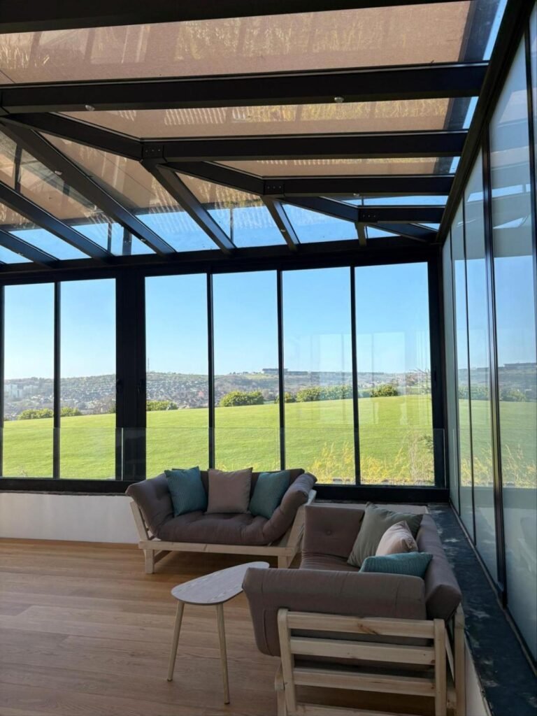 Fixed glass roof terrace with zip blinds and sea views, Roedean Crescent, Brighton