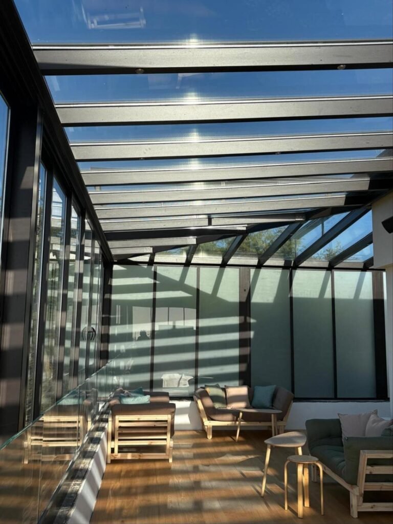 Fixed glass roof terrace with zip blinds and sea views, Roedean Crescent, Brighton